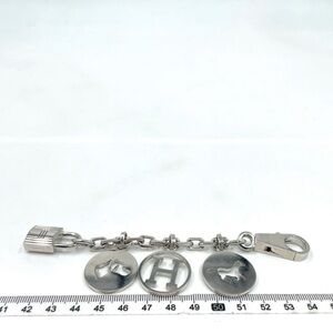 Authentic Hermes Palladium Breloque Olga Bag Charm in Silver